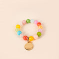 Carica l'immagine nel visualizzatore della galleria, BRACCIALE ELASTICO CON PIETRE COLORATE E CIONDOLO
