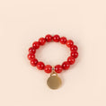 Carica l'immagine nel visualizzatore della galleria, BRACCIALE ELASTICO CON PIETRE COLORATE E CIONDOLO

