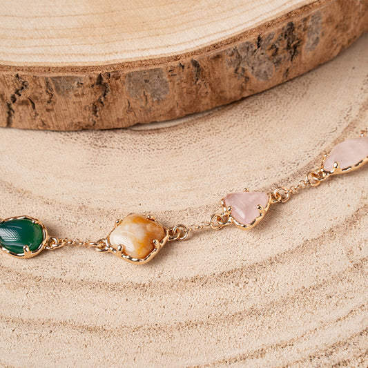 BRACCIALE CON PIETRE DI FORME E COLORI DIVERSI