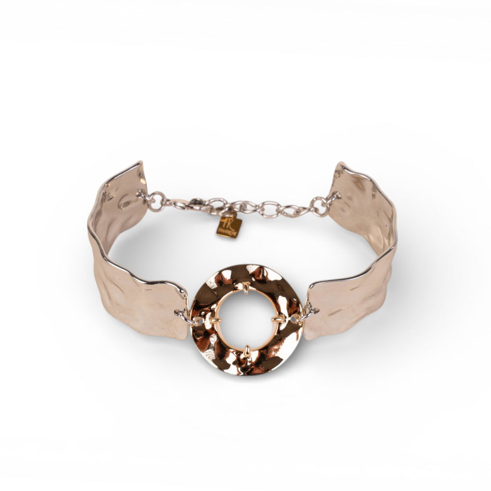 BRACCIALE CON UNITA RIGIDE MARTELLATE E PIETRA CENTRALE