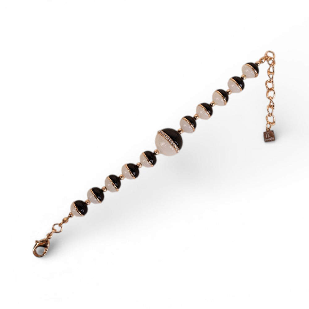 BRACCIALE CON SFERE DIVISE A META