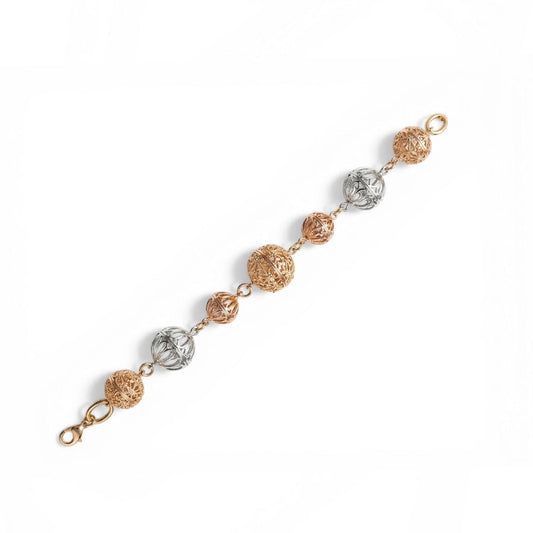 BRACCIALE MORBIDO A CATENA CON SFERE INTAGLIATE