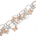 Carica l'immagine nel visualizzatore della galleria, BRACCIALE A PIU FILE DI ANELLI OVALI CON FARFALLE INTAGLIATE

