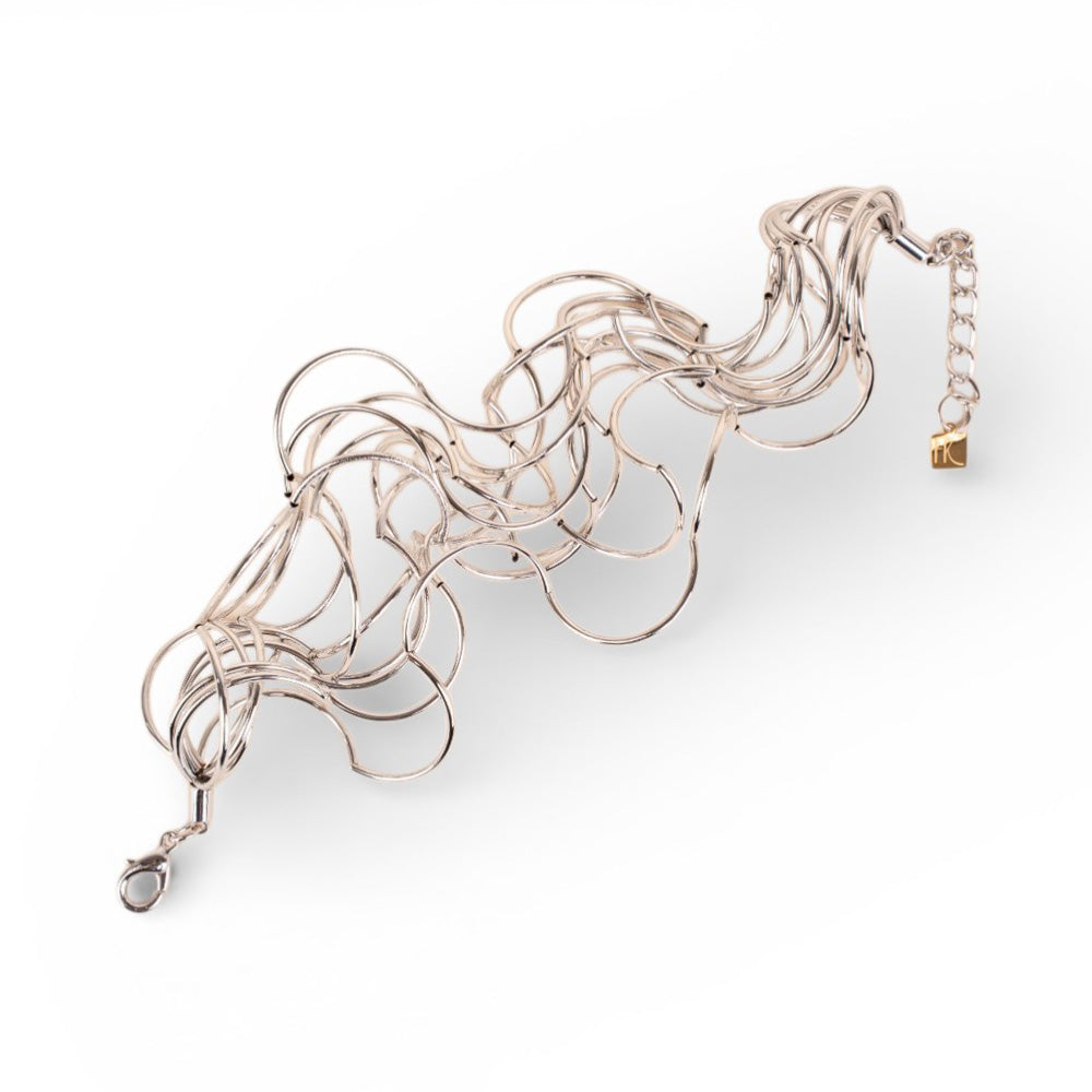 BRACCIALE MULTIFILO CON TRAMA ONDULATA