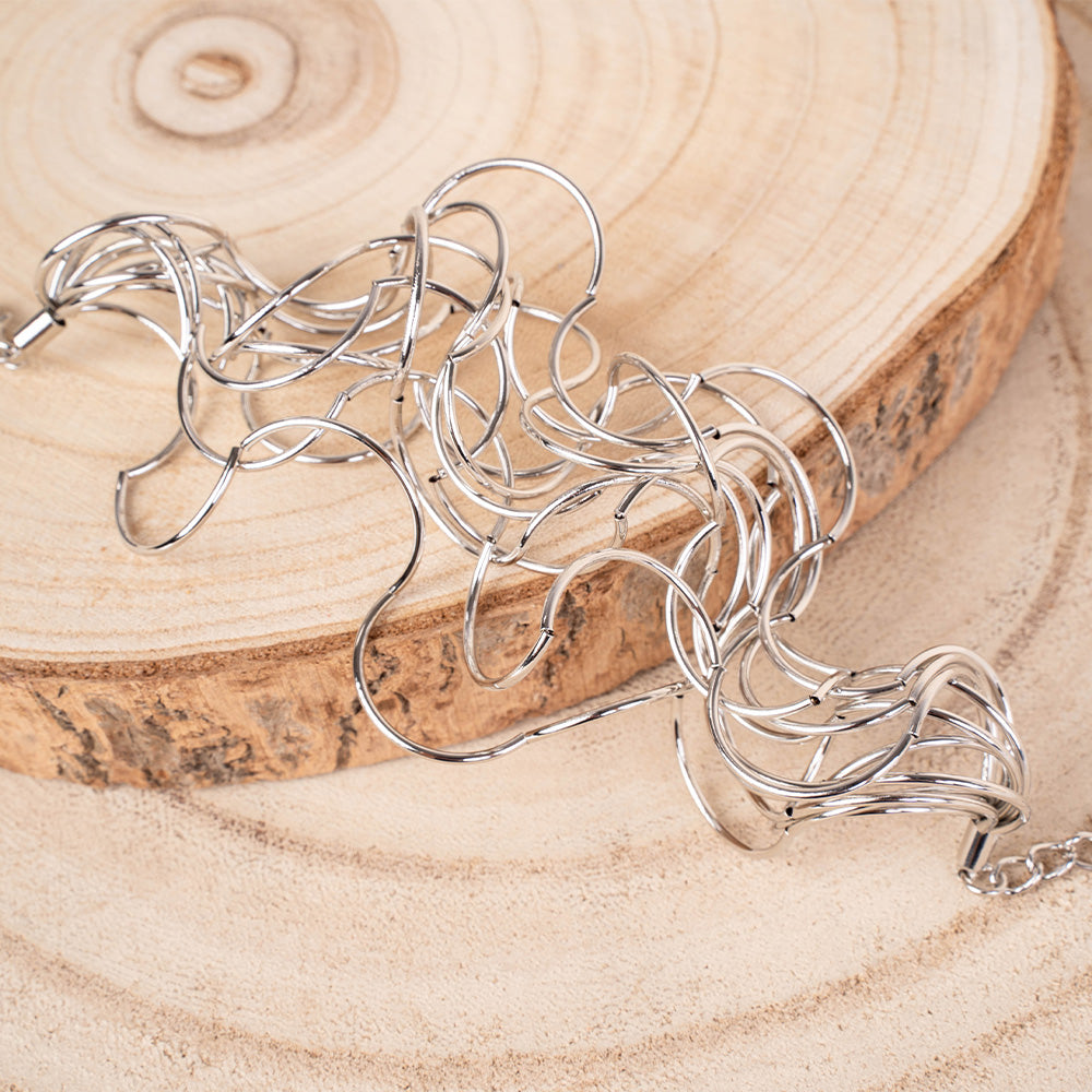 BRACCIALE MULTIFILO CON TRAMA ONDULATA