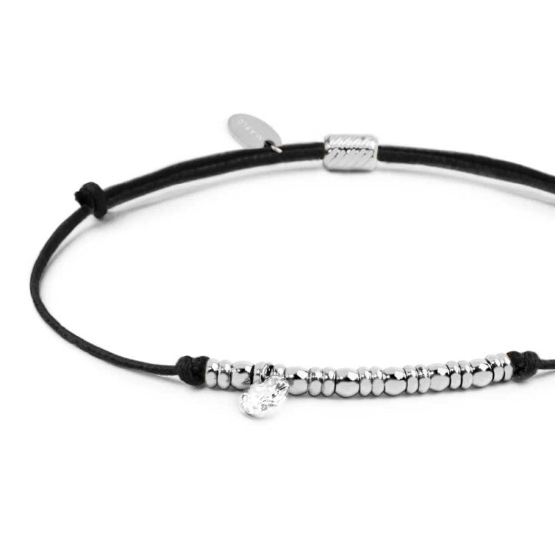 Bracciale cordino con elementi acciaio e zircone pendente
