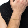 Carica l'immagine nel visualizzatore della galleria, Bracciale cordino con elementi acciaio e zircone pendente
