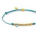 Carica l'immagine nel visualizzatore della galleria, Bracciale cordino con elementi acciaio e zircone pendente
