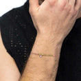 Carica l'immagine nel visualizzatore della galleria, Bracciale cordino con elementi acciaio e zircone pendente
