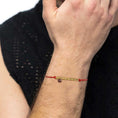 Carica l'immagine nel visualizzatore della galleria, Bracciale cordino con elementi acciaio e zircone pendente
