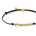 Carica l'immagine nel visualizzatore della galleria, Bracciale cordino con elementi acciaio e zircone pendente
