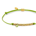 Carica l'immagine nel visualizzatore della galleria, Bracciale cordino con elementi acciaio e zircone pendente
