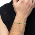 Carica l'immagine nel visualizzatore della galleria, Bracciale elementi di ematite sfacetttata con occhio centrale
