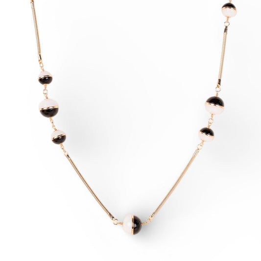 COLLANA LUNGA CON SFERE DIVISE A META E BASE TUBULARE