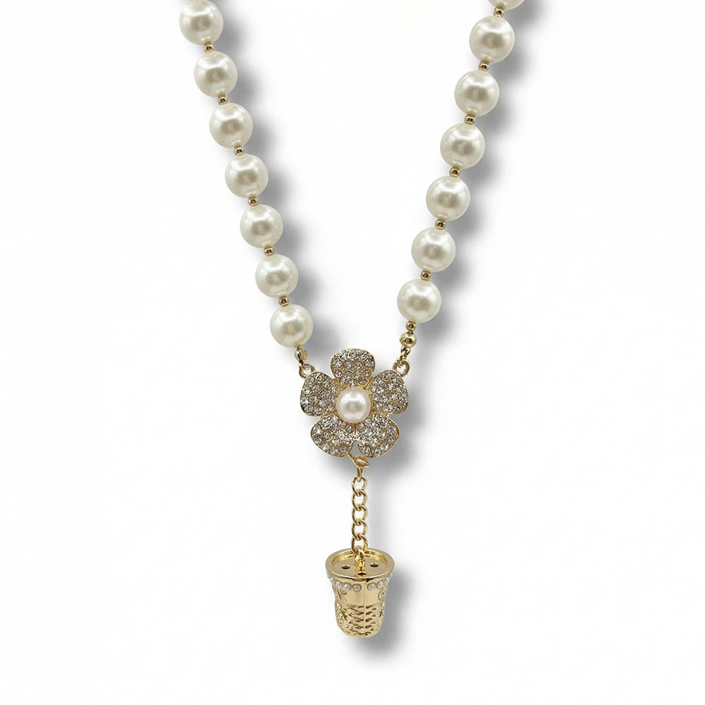 COLLANA GIROCOLLO CON PERLE E PENDENTI A FORMA DI FIORE E DITALE