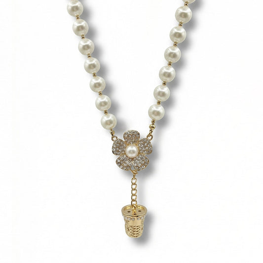 COLLANA GIROCOLLO CON PERLE E PENDENTI A FORMA DI FIORE E DITALE