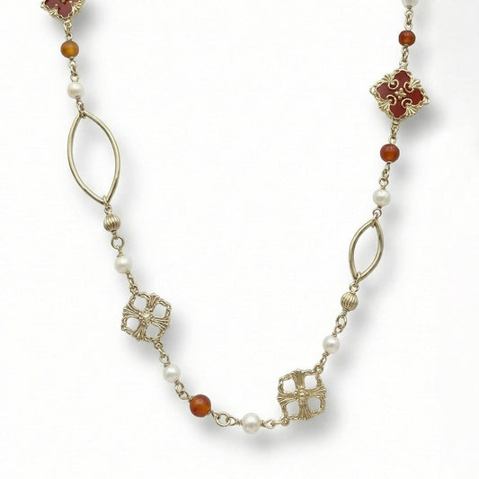 COLLANA LUNGA CON ELEMENTI A FIORE E PERLE