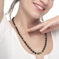 Carica l'immagine nel visualizzatore della galleria, Collana con onice nera ovale e sfere occhio di tigre

