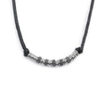 Carica l'immagine nel visualizzatore della galleria, Collana cordino strobel elementi in acciaio con trama puntinata in black oil
